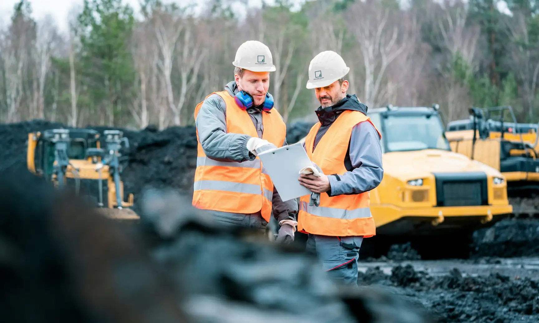 Photo of two Sylvan Crest construction workers developing land